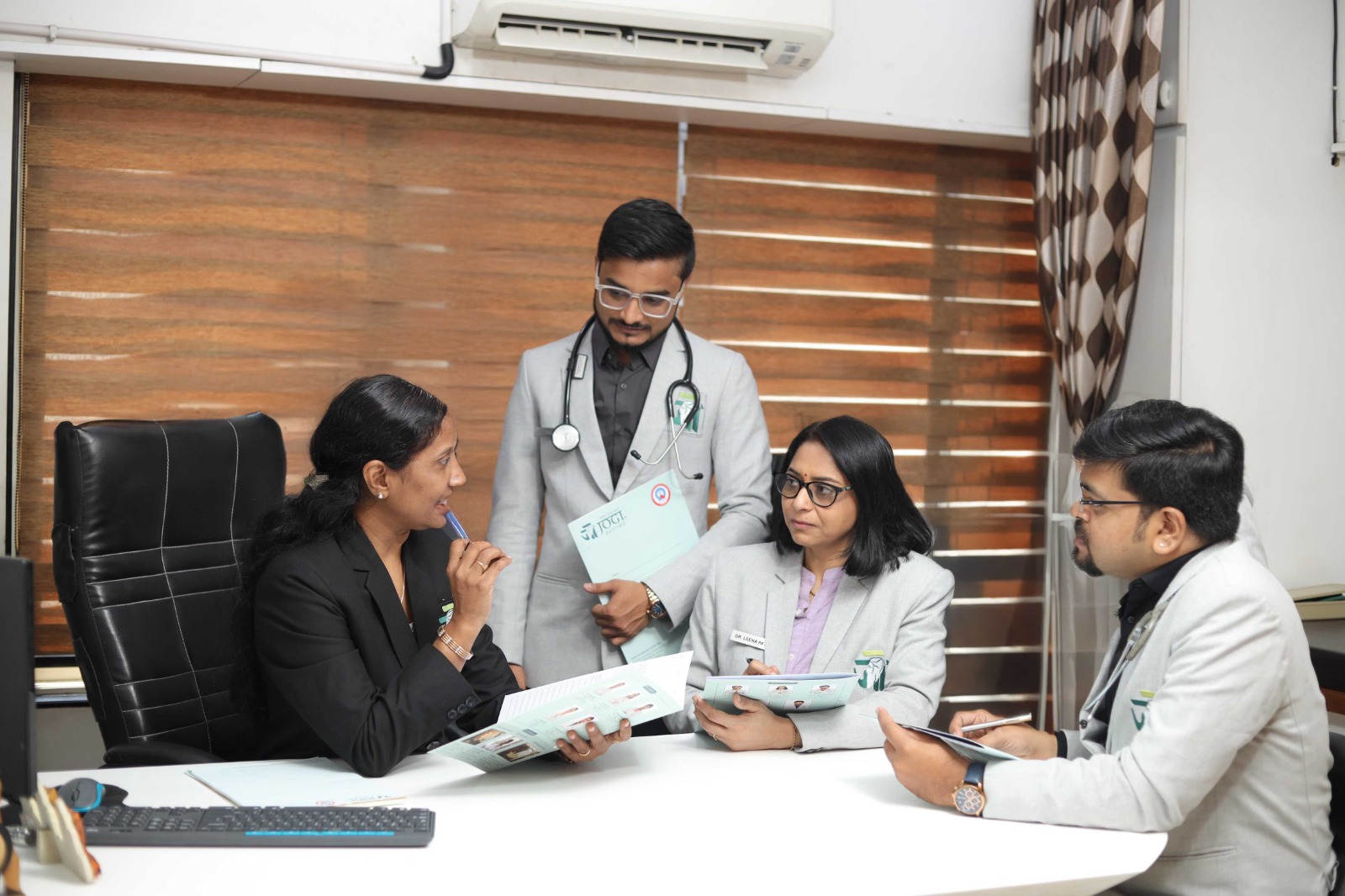 Group of Doctors discussing at JOGI Ayurved Hospital.